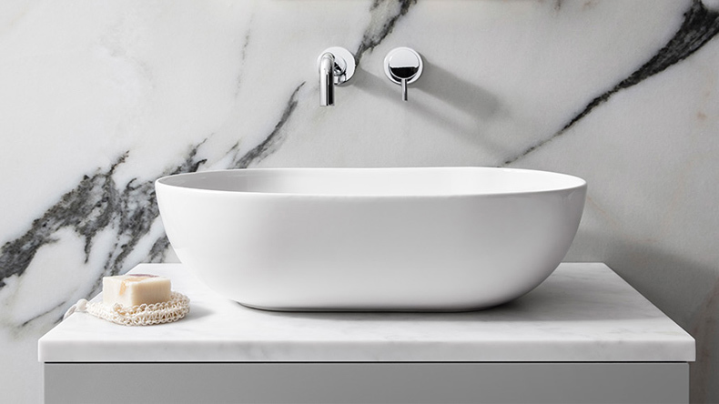 white oval countertop basin
